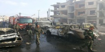  42 قتيلا في عمليتين انتحاريتين ضد مقرين أمنيين في حمص   