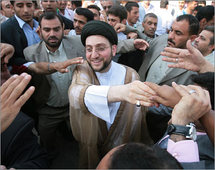 عمار الحكيم وسط اشياع ابيه