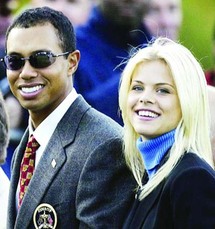 لاعب الغولف تايغر وودز وزوجته