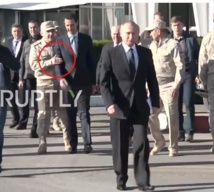 بوتن في قاعدة حميميم وخلفه وليس بجانبه الاسد