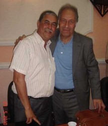 الدكتور مصطفى فاسي برفقة رئبس قسم اللغة رشيد كوراد