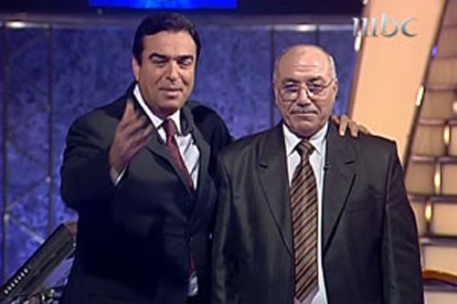 الاعلامي جورج قرداحي مع  السوري