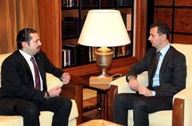 الرئيس السوري بشار الاسد ورئيس الوزراء اللبناني سعد الحريري