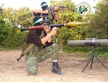 مقاتلون من كتائب عز الدين القسام الجناح العسكري لحركة حماس مقاتلون من كتائب عز الدين القسام الجناح العسكري لحركة حماس