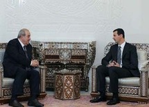 رئيس القائمة العراقية اياد علاوي مع الرئيس السوري بشار الأسد
