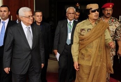 عباس والقذافي ...لا اشارة لفلسطين في البيان الختامي