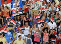 مشجعو ومشجعات المنتخب السوري