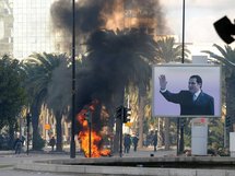 بن علي يتفرج على حرائق تونس - خاص بالهدهد بن علي يتفرج على حرائق تونس - خاص بالهدهد