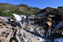 ارتفاع عدد قتلى زلزال إندونيسيا إلى 2113  وآلاف المفقودين