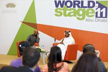 عبدالله العامري واكرم خان في ندوة التعريف بالطريق العمودي