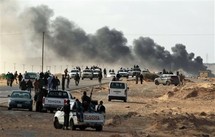 القوات الموالية للقذافي تمنع دخول الإسعاف الى راس لانوف وتواجه جيوب مقاومة القوات الموالية للقذافي تمنع دخول الإسعاف الى راس لانوف وتواجه جيوب مقاومة