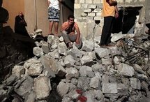 ليبيا تتهم الحلف الاطلسي بقتل تسعة اشخاص بينهم طفلان في غارة ليلية على طرابلس