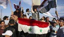 15 قتيلا بينهم طفلان في مظاهرات حاشدة في سوريا تنادي باسقاط الأسد 