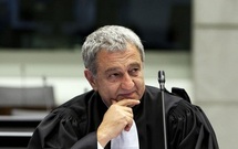 اكرم عازوري محامي الرئيس المخلوع
