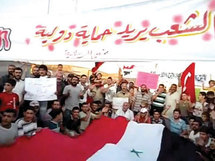 تظاهرات مؤيدة للمجلس السوري  ومجلس الامن يتجه للتصويت على قرار الإدانة