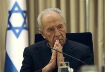 بيريز يحذر من ان احتمالات شن هجوم على ايران قبيل تقرير الثلاثاء النووي