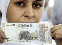 الليرة تتراجع والصين قلقة وباريس تطلب من المعارضة ان توحد صفوفها 