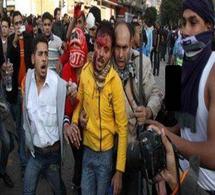 مواجهات ميدان التحرير في القاهرة تخلف 33 قتيلا واستقالة وزير الثقافة