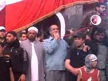 نجاتي طيارة يخطب في حمص قبل اعتقاله