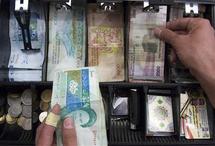 التجار العراقيون ينبذون العملة الايرانية تدريجيا