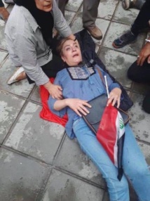 عراقية سقطت وعلمها بيدها عراقية سقطت وعلمها بيدها