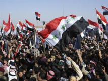 متظاهرون يتوافدون على بغداد في ذكرى النصر على داعش