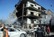 انفجارات في دمشق واشتباكات بالقرب من مقر الإقامة الصيفي للأسد في اللاذقية