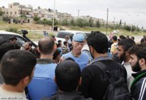 المراقبون الدوليون في سوريا يعلقون مهمتهم " لتصاعد العنف"