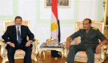 مرسي أول رئيس مدني لمصر يبدأ ولاية تعايش مع العسكر مرسي أول رئيس مدني لمصر يبدأ ولاية تعايش مع العسكر