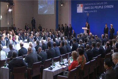 السوريون يطالبون أصدقاء سوريافي باريس بمنطقة حظر جوي  