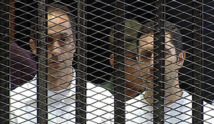 بدء محاكمة نجلي مبارك بتهمة التربح من بيع البنك الوطني المصري