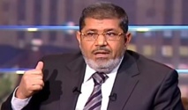 مرسي يدعو الأسد للتخلي عن السلطة ويطالب بمحاكمته كمجرم حرب