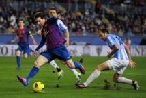 برشلونة يكتفي بثلاثة أهداف في شباك ملقة ويعزز صدارته للدوري الأسباني برشلونة يكتفي بثلاثة أهداف في شباك ملقة ويعزز صدارته للدوري الأسباني