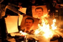إحراق صورة للإرهابي "بشار" وكتابات مناهضة بريف دمشق
