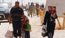 سوريون عائدون الى حلب يحاولون استعادة حياتهم الطبيعية وسط الحرب والدمار سوريون عائدون الى حلب يحاولون استعادة حياتهم الطبيعية وسط الحرب والدمار