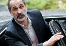 الخطيب يرأس الوفد السوري في قمة الدوحة ويجلس في مقعد دمشق