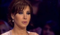 نانسي عجرم تبكي على الهواء وراغب علامة يتمسك بفتاتين من مواهب أراب آيدل