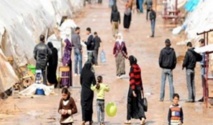 أطفال اللاجئين السوريين يجبرون على العمل أوالقتال والبنات على الزواج