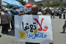 اشتباكات بين مؤيدي مرسي ومعارضيه بالقاهرة والشرطة ترد بالغاز المسيل للدموع 