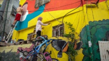 جداريات "سلوان" تشهد على مشكلة المستوطنات الإسرائيلية بالقدس