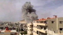 اشتباكات بريف دمشق و"براميل" على حلب