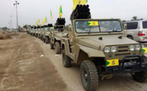 مركبات "سفير" عليها ألوان حزب الله العراقي. مركبات "سفير" عليها ألوان حزب الله العراقي.