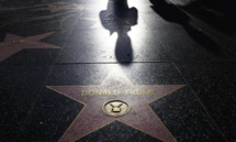 نجمة تحمل اسم ترامب في شارع النجوم في هوليود (إيكونوميست) نجمة تحمل اسم ترامب في شارع النجوم في هوليود (إيكونوميست)