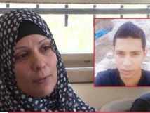 والدة مهند الحلبي وفي الاطار مهندد والدة مهند الحلبي وفي الاطار مهندد