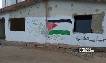 جدارية في مدخل مخيم "اليرموك" للاجئين الفلسطينيين في سوريا 20 شباط (عنب بلدي-بيسان خلف)