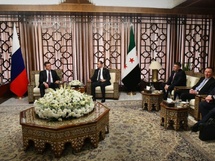 الوفدان السوري والروسي في دمشق - الاخبارية