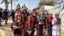 فعالية نسوية في مخيم "رفعت العرعير" تستحضر التهجير الفلسطيني عام 1948 وتربط بين النكبة التاريخية وحرب الإبادة الإسرائيلية المستمرة على القطاع- ايه ايه