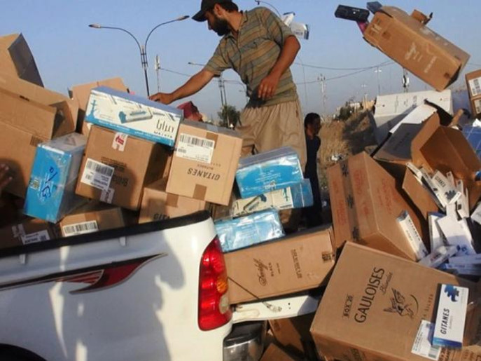   طوابير في الموصل لشراء السجائرالتى منعها تنظيم داعش