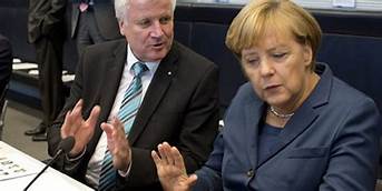 ميركل ووزير داخليتها