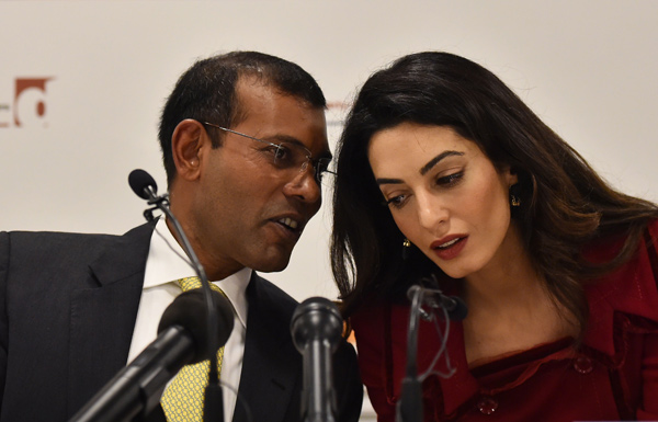 عبد الله يمين وامل كلوني